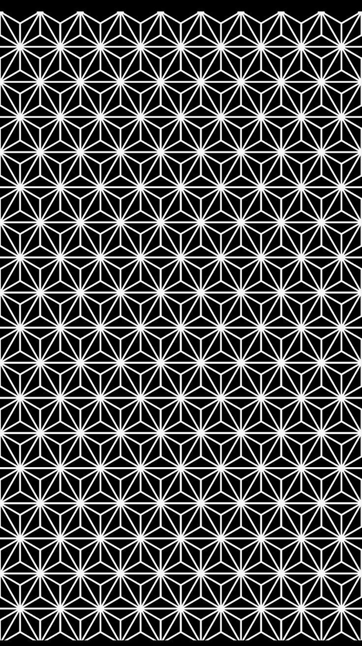 an abstract black and white pattern with small stars in the center, on a black background