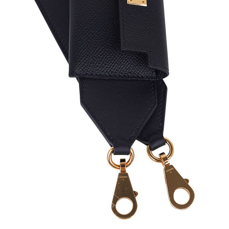 Guaranteed authentic Hermes Kelly Pocket Shoulder Strap featured in Black.The strap has a card holder with a Kelly turn key clasp.Gold hardware. Strap is Swift leather and card case is Epsom leather.Comes with sleeper and signature Hermes box.New or Pristine Store Fresh Condition.Listing is for the strap only.final saleSTRAP MEASURES:44" X 2"CONDITION:New or Pristine Store Fresh Condition Gold Hardware, Swift, Shoulder Strap, Wallet, Turn Ons, Leather, Gold, Black