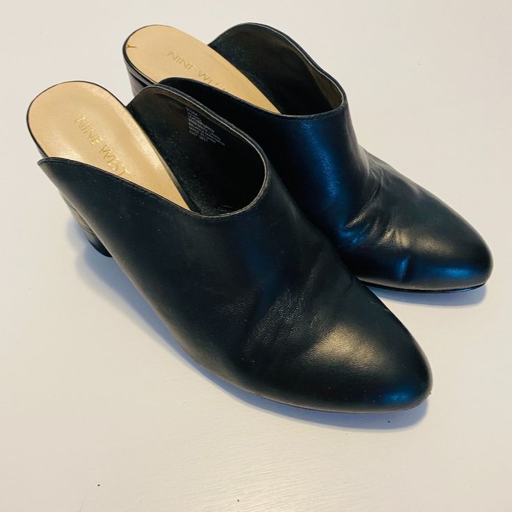 New With No Box No Flaws Smoke And Pet Free Home Black Mules With Deep Heel Cup And Medium Width, Black Low Heel Mules With Deep Heel Cup, Mules With 4-inch Heel And Round Toe, Workwear Mules With 4-inch Heel, Black Synthetic Mules With Sculpted Heel, Synthetic Mules With 4-inch Heel For Work, Workwear Mules With 4-inch Heel In Synthetic, Workwear Mules With 4-inch Heel In Synthetic Material, Workwear Mules With 4-inch Heel And Synthetic Material