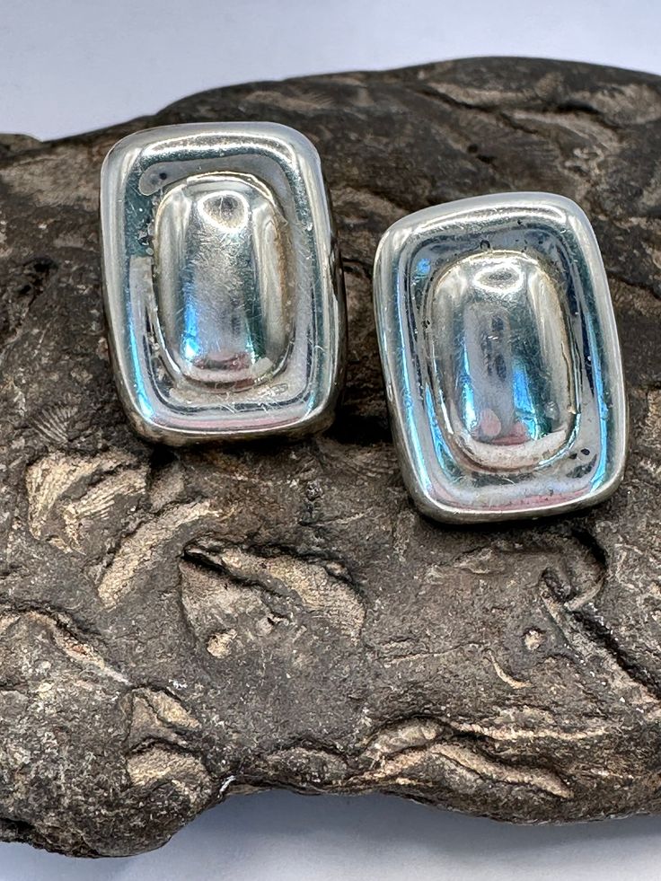 Solid Sterling Silver Mexican 1 inch Clip Earrings. Good vintage condition. Classic Metal Clip-on Earrings Nickel Free, Classic Nickel-free Metal Clip-on Earrings, Handmade Retro Silver Earrings, Nickel Free Retro Formal Earrings, Nickel Free Retro Earrings For Formal Occasions, Vintage Silver Nickel-free Plug Earrings, Nickel-free Retro Formal Earrings, Vintage Formal Hoop Earrings, Vintage Nickel-free Silver Plug Earrings