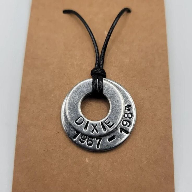 a necklace with an inscription on it