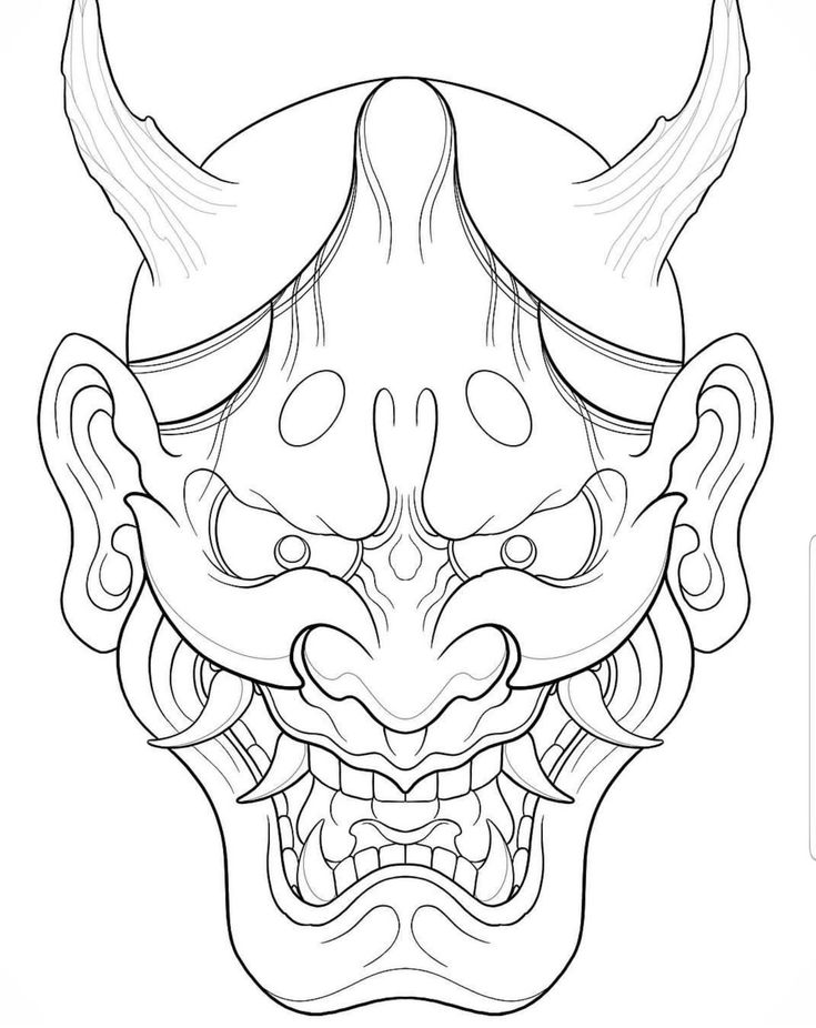 a demon mask with horns and fangs on it