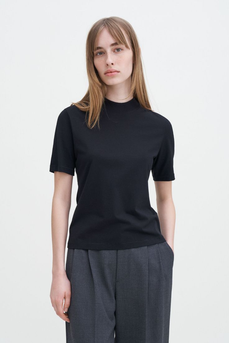 Mock Neck Tee Cotton T-shirt With Ribbed Collar For Work, Classic Stretch T-shirt For Workwear, Classic Short Sleeve T-shirt For Fall, Classic Fitted T-shirt With Ribbed Collar, Cotton Turtleneck Tops For Everyday, Classic Crew Neck T-shirt With Ribbed Collar, Modern Tops With Ribbed Crew Neck, Classic T-shirt With Ribbed Crew Neck, Black Short Sleeve Tops With Ribbed Collar