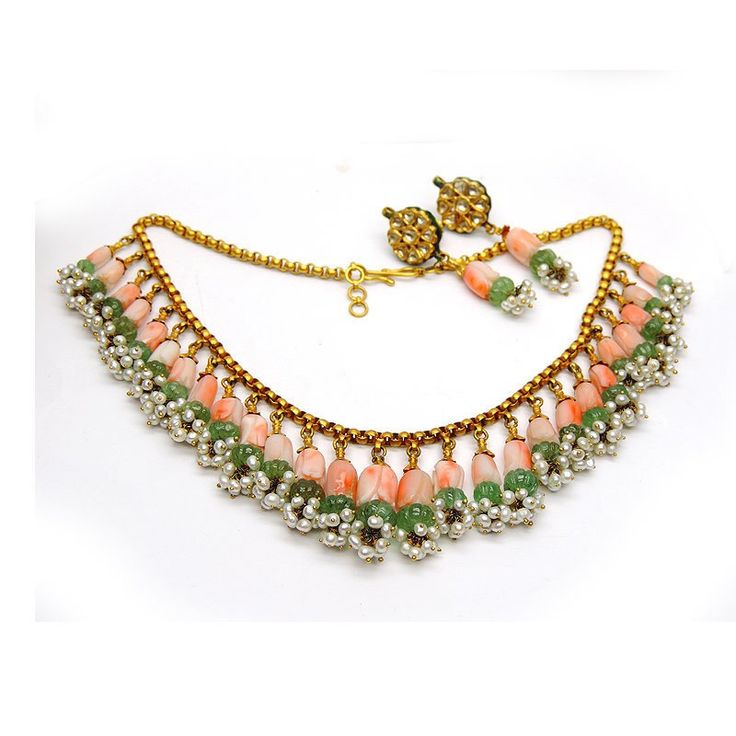 "Unique Vintage Coral Necklace Set 22k gold and single cut Diamond RARE find. Never Worn Vintage Indian Moughal Coral Emerald Necklace Set . 15\" length necklace. Coral - 110-135 cts Emerald- 30-45 cts Pearl 20-22 cts Single Cut Diamond 1 ct 22k Gold 40-42 gms Carved Light double colored Coral - Never Worn - in ORIGINAL condition - excellent condition with NO problems. Original Natural Carved Emerald Beads. The Earrings Measure 1.93 inchx.58 inch. Coral in the earrings measure .38inchx.29inch. E Orange Temple Jewelry Gift, Orange Temple Jewelry For Gifts, Orange Temple Jewelry As A Gift, Ceremonial Temple Jewelry Necklace With Matching Earrings, Festive Orange Jewelry Gift, Festive Orange Jewelry For Gift, Handmade Orange Jewelry For Festive Season, Traditional Gold-plated Jewelry With Dangling Beads, Traditional Orange Necklace For Festive Occasions