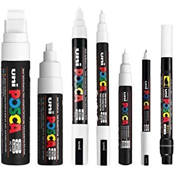 several different types of markers and pens with the words posca black white on them