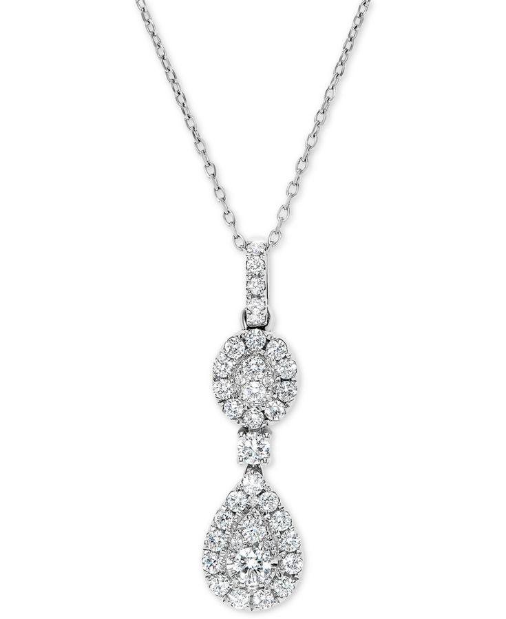 A duet of beautiful clusters, one oval-shaped and one teardrop radiate stunning round-cut diamond sparkle on this ultra-glamorous diamond pendant necklace set in luxurious 14k white gold.