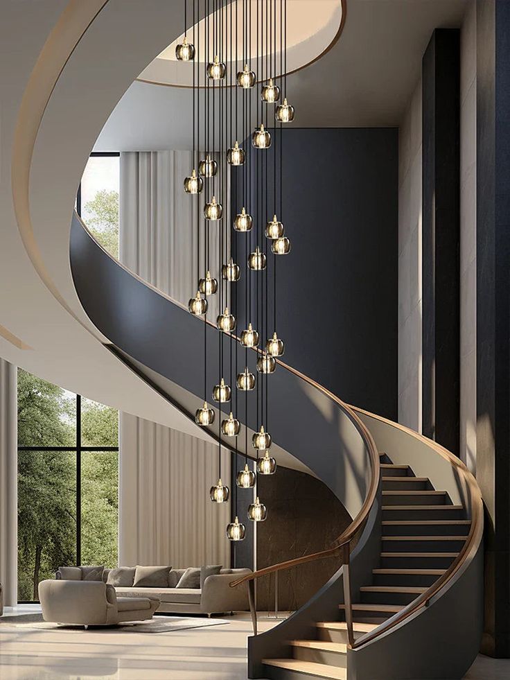 a large spiral staircase with chandeliers in a living room