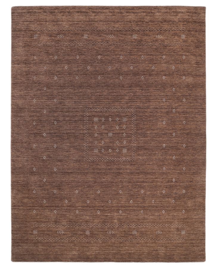 a brown rug with dots and squares on it