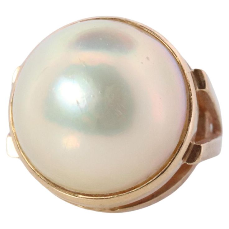 Genuine Tasaki ring 14k Yellow Gold with Mabe Pearl Solitaire. Details: Size 5 6.6grams total 15mm High Quality Mabe Pearl.