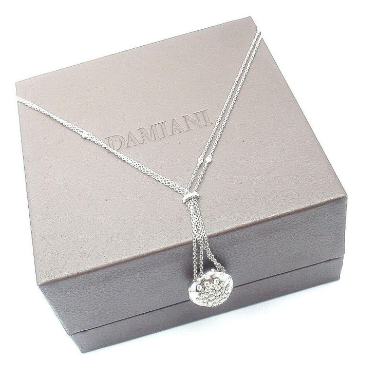 About This Piece: This Necklace comes with Box and Certificate Retail: $12,590  Metal: 18k White Gold  Measurements:  Length: 15" around neck with 2" drop  Weight 14.5 grams  Stones: Diamonds 1.19ct.  Hallmarks: Damiani 750    Please refer to the dimensions in the description above for accurate measurements. Please reach out to the seller with any questions on dimensions or fit prior to purchase. Chanel Flower, Diamond Circle Necklace, Flower Necklace Gold, Vintage Rhinestone Necklace, Dior Necklace, Virgin Mary Necklace, Drop Weight, Vintage Beads Necklace, Peridot Necklace