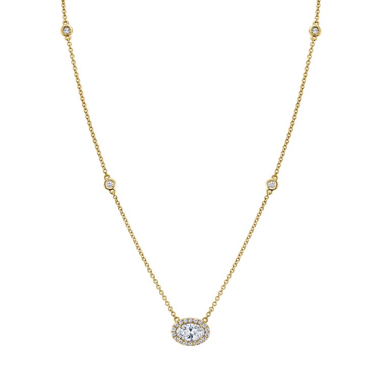 Oval diamond pendant with pavé set in 18K yellow, white and rose gold. Total Weight of .75 carats Color E, Clarity VS2 Luxury Oval Diamond Necklace With Rose Cut, Gold Diamond Necklace With Oval Pendant, Oval Rose Cut Diamond White Necklaces, Oval Rose Cut Diamond White Necklace, Classic Gold Oval Diamond Necklace, Oval Necklace With Rose Cut Diamonds In Diamond White, Exquisite Gold Oval Diamond Necklace, Oval Rose Cut Diamond Necklace, Oval Diamond Necklace With Halo Setting