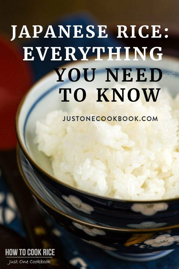 rice in a blue and white bowl with the words japanese rice everything you need to know