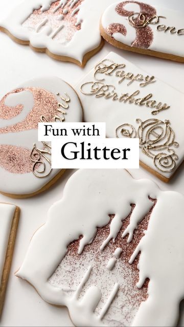 decorated cookies with the words fun with glitter written in white and gold icing on them