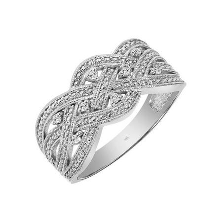 This Keepsake diamond-accent anniversary ring is set in sterling silver. This ring features eight round diamonds (I-J, I2-I3) placed within a multi-row woven design. A milgrain finish completes the look. This charming diamond band can be stacked with other rings in your jewelry collection or worn alone to show your style. This diamond band makes a beautiful gift for an anniversary or any special occasion. Size: 5.  Color: White.  Gender: female.  Age Group: adult. Classic White Gold Diamond Ring With Decorative Band, Elegant White Gold Rings With Decorative Band, Classic Silver Diamond Ring With Decorative Band, Anniversary Diamond Ring In White Gold With Decorative Band, Classic White Rings With Decorative Band, Classic Silver Rings With Diamond Accents, Silver Diamond Ring With Decorative Band, Classic Diamond Ring With Decorative Band, Formal White Gold Diamond Ring With Decorative Band