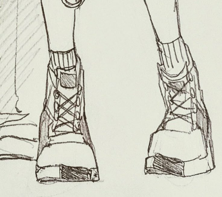 a drawing of someone's feet with laces on them and their boots tied up