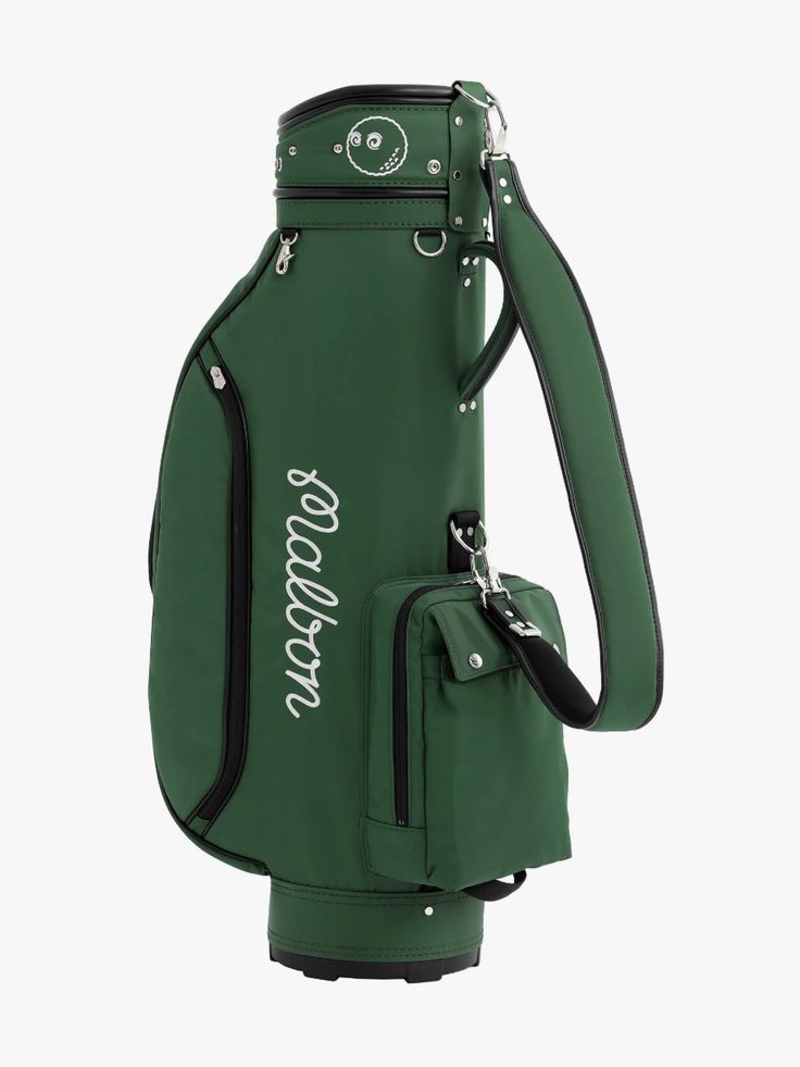 a green golf bag sitting on top of a white background