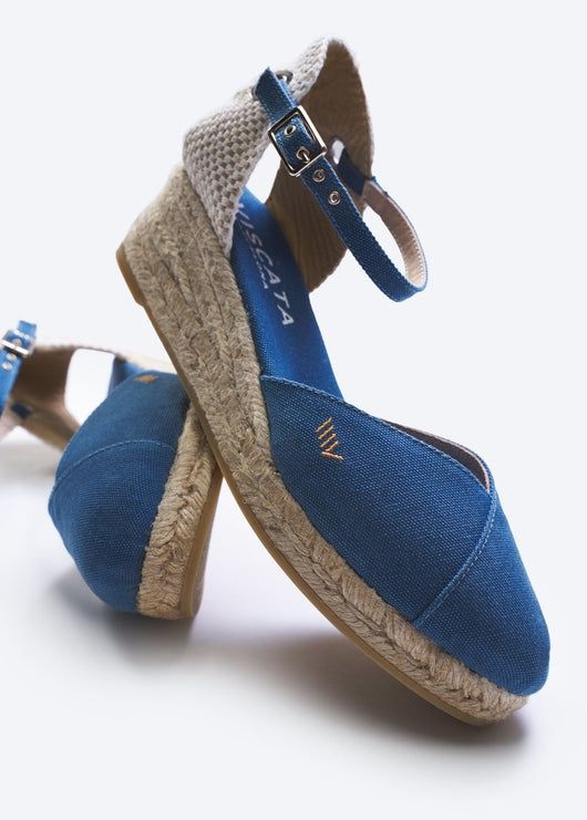 You’ll get compliments galore when you step out in our Pubol espadrille wedges. Classic, sleek and charming with breathable materials and a soft ankle bucket strap and inner soles that are as soft as the air. A sturdy 2” heel makes these shoes great for walking and the flattering V-vamp toe will turn heads wherever you go. TOP TIP: STYLE Slip on a pair of Pubols and you'll feel like you are on Cloud. With superior craftsmanship and extra padded comfort, these will make you feel like you are walk Sell Shoes, Walking On Clouds, Low Wedges, Green Jeans, 2 Inch Heels, Womens Wedges, Perfect Shoes, Espadrilles Wedges, Comfortable Fashion