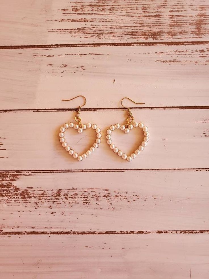 "These fun heart earrings measure 1.25\" tall and 1.25\" wide.  They are perfect for dressing up or casual wear and especially cute for Mothers Day. The fish hooks are nickel free, gold color.  Made in the USA. Ready to ship. -Includes Gift Box This is a limited item." Earrings Hearts, Earring Pearl, Heart Earring, Jewelry Heart, Fish Hooks, Pearl Heart, Earrings Christmas, Christmas Earrings, Earrings Statement