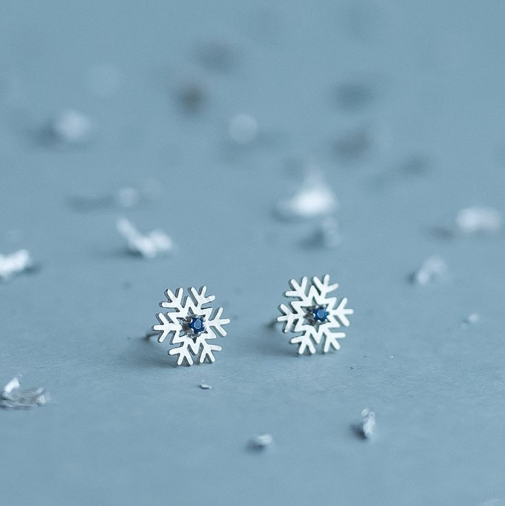 Snowflakes silver earrings with cubic zirconia stone. Unusual and fresh representation of earrings.  You can choose different color of the stone Details: - diameter: 10 mm - stud length: 12 mm - clasp: silver 925 We have special conditions for purchasing of sets. You can save up to 15%. Please refer to the announcements on the main page for details. Item can be changed on request. If you want to change something in this item please inform me before ordering. Please read my shipping and policies Snowflake Earrings Studs, Snowflake Sparkling Earrings For Gift, Sterling Silver Snowflake Earrings, Silver Snowflake Cubic Zirconia Earrings, Cubic Zirconia Snowflake Earrings For Gift, Snowflake Earrings For Winter Gift, Silver Snowflake Earrings For Gift, Winter Snowflake Earrings For Gifts, Silver Snowflake Earrings