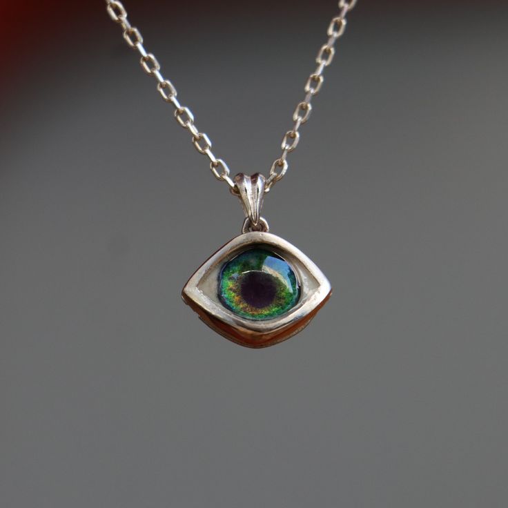 Minimalist Eye Necklace, Little Cute Eye Pendant, Green Tiny Eye Necklace, Personalized Design Necklaces, 925K Silver Pendant, Gift Idea My eye designs can be made specifically for your eyes, you need to take a beautiful iris photo for us. Then we can customize it for you. You can also add or remove blood details to our eye designs. You can write this in the order notes. Please send me a message after ordering. I can do as you wish. A quasi-universal symbol of protection, the evil eye is referre Custom Fine Jewelry Sterling Silver Pendant Necklace, Custom Sterling Silver Pendant Necklace, Green Sterling Silver Charm Necklace, Sterling Silver Custom Necklace With Round Pendant For Everyday, Sterling Silver Gemstone Pendant Charm Necklaces, Green Gemstone Charm Necklace In Sterling Silver, Green Gemstone Sterling Silver Charm Necklace, Sterling Silver Custom Necklace, Minimalist Sterling Silver Custom Necklace With Round Pendant