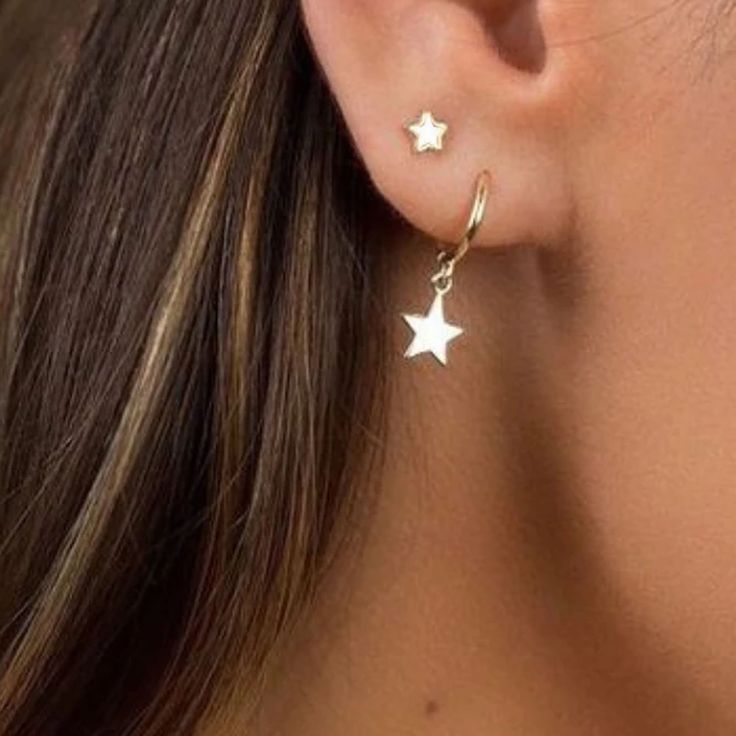 These Earrings are Sterling Silver Hoops with a hanging star. They are earrings that feel great for day to day or for a special occasion. They are modern and minimalist in style and you can wear them both on the earlobe and on the cartilage. You can buy the earrings in sterling silver or silver with a gold plating. Features: 925 sterling silver silver or gold plated Diameter: 11mm nickel free. If you have any questions, do not hesitate to contact us, we will be happy to assist you! Ear Stacks, Star Hoop Earrings, Hammered Hoop Earrings, Bar Stud Earrings, Earring Collection, Tiny Star, Ear Candy, Emerald Earrings, Everyday Earrings