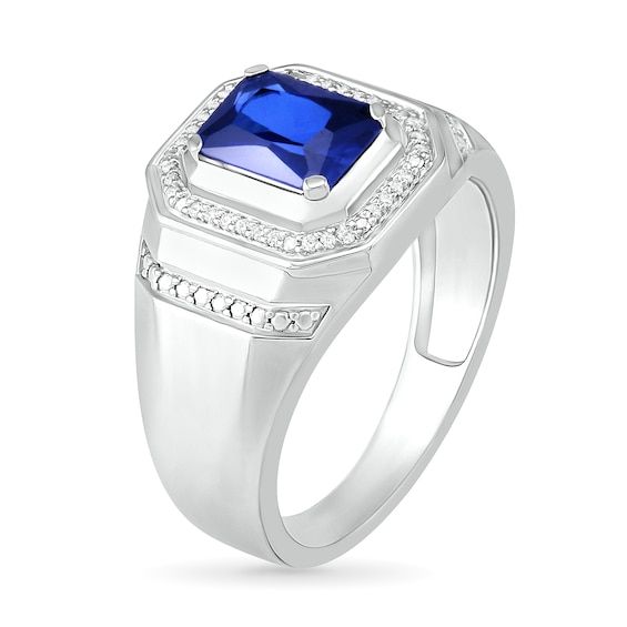 He'll appreciate the geometric details of this luxe fashion ring. Crafted in sterling silver, this style showcases an 8.0 x 6.0mm emerald-cut bright blue lab-created sapphire - wrapped in an octagonal frame of diamonds and a polished border. Along the bevel-edged shank, beaded collars flank the center design to complete the look. Radiant with 1/10 ct. t.w. of diamonds and a brilliant buffed luster, this ring is guaranteed to impress. Elegant Sapphire Signet Ring, Modern Sapphire Ring With Diamond Accents, Elegant Rectangular Lab-created Sapphire Rings, Formal Sterling Silver Open Halo Ring, Fine Jewelry Sapphire Rectangular Ring, Timeless Lab-created Sapphire Promise Ring, Modern Sapphire Ring With Rectangular Shape, Rectangular Lab-created Sapphire Fine Jewelry, Formal Sterling Silver Signet Ring With Diamond Accents