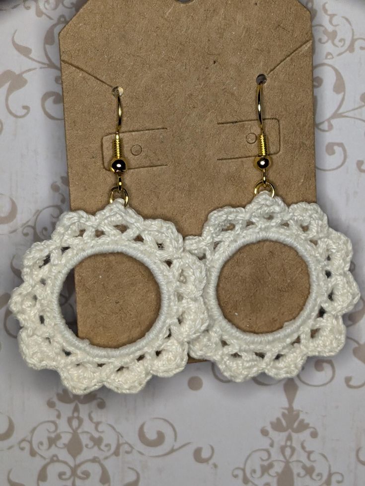 Beautiful crochet earrings. Complete your outfit with these casual earrings. Handmade Casual Hoop Earrings, Handmade Casual Hoop Earrings As Gift, Casual Handmade Hoop Earrings As Gift, Casual White Drop Earrings, White Crochet Dangle Earrings, Crochet Dangle Jewelry, Bohemian White Crochet Earrings, Handmade Casual Flower Earrings, Handmade Casual Drop Earrings