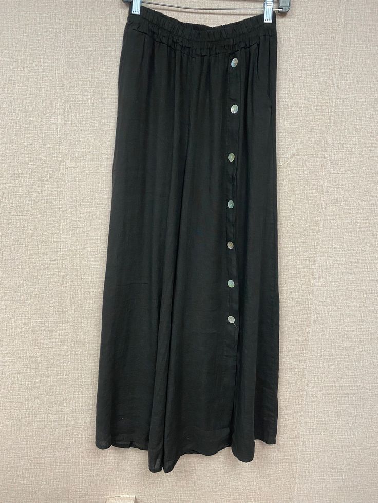 Experience Italian luxury with these 100% linen wide-leg pants. Featuring a button-down leg for an elegant look, these pants are both comfortable and stylish. The perfect addition to any wardrobe, these fun, versatile pants are sure to be a timeless favorite. It also can be worn as a bathing suit cover-up. Wide Leg Pants Men, Versatile Pants, Bathing Suit Covers, Bathing Suit Cover Up, Wide Leg Linen Pants, Pants Men, Italian Luxury, Bathing Suit, Leg Pants