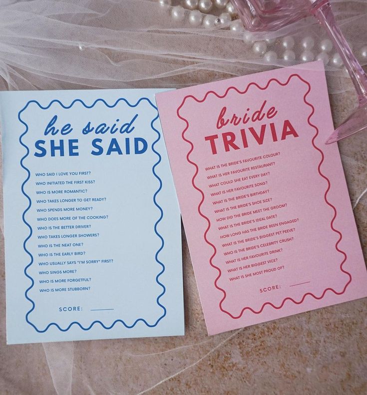 two cards that say she said and bride's trivia on the table next to each other