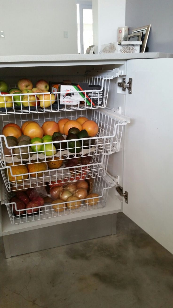 an open refrigerator filled with lots of fruit