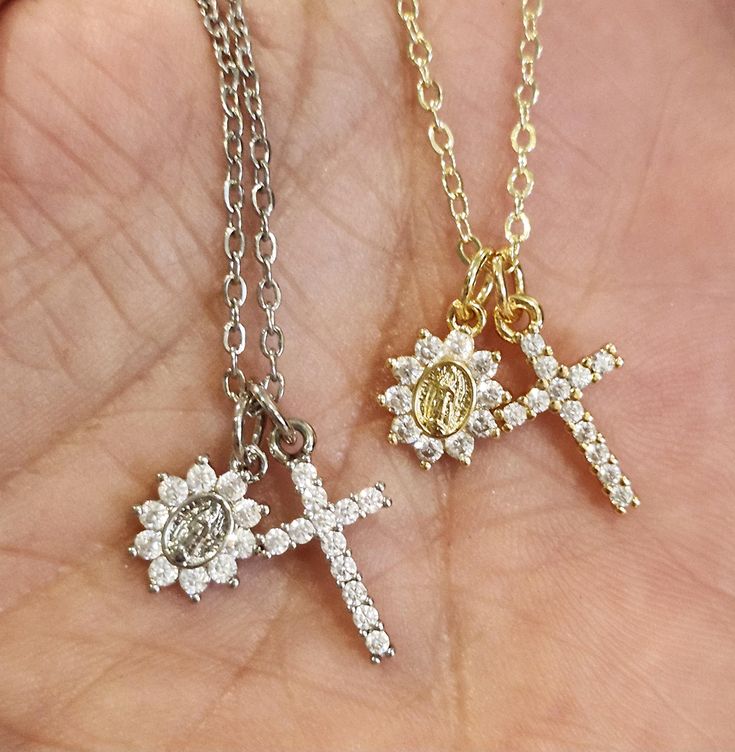 12x9x2mm Gold and Silver Plated Brass Dainty Blessed Mother Charm has beautiful Prong Set High Quality Cubic Zirconia. Stunning Prong Set Cubic Zirconia Cross Pendant is Gold and Silver Plated Brass and is 19.5x9mm. Gold Chain is Gold Plated brass, Silver Is Stainless Steel, 1mm cable link, 16" with a 2" extender chain and Lobster Clasp. If you want for a child, please specify length or age in note section Silver Tarnish Resistant Necklace For Wedding, Silver Tarnish-resistant Wedding Necklaces, Silver Tarnish Resistant Wedding Necklace, Silver Tarnish-resistant Wedding Necklace, Miraculous Medal Jewelry Gift For Mother's Day, Miraculous Medal Necklace For Mother's Day Gift, Mother's Day Gift Jewelry With Miraculous Medal, Dainty Cross Jewelry In Cubic Zirconia, Dainty Cubic Zirconia Cross Jewelry