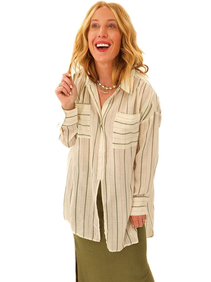 Lightweight and the cutest swim cover or paired with denim and front tuck would be the ultimate comfortable look. - Oversized tunic - Ivory and green striped top - Chest pockets - Button downs top half - Splits open below buttons in the front - Gathered in the back - 65% Rayon // 35% Polyester - Color may vary due to lighting on image Meet Klarisa // Wearing Size Small Height // 5’6 Bust // 32” Waist // 27” Bottom Workout, Front Tuck, Striped Tunic, Oversized Tunic, Jumpsuit Jacket, Sweater Tank Top, Women Long Sleeve Tops, Swim Cover, Dress Romper