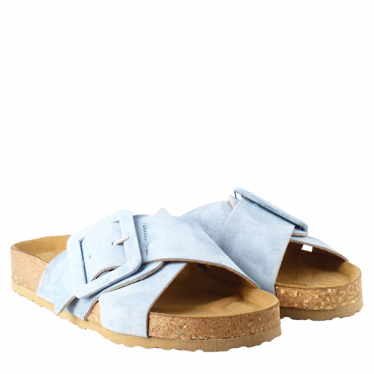 Women's sandals with double woven buckle

Light blue suede

Cork and rubber sole

Padded insole

Made in Italy

Composition:
 Upper: 100% Suede
 Lining: 100% Leather
 Bottom: Cork and rubber
 Insole: 100% Leather Suede Slide Sandals With Buckle Closure, Beach Suede Double Strap Footbed Sandals, Suede Sandals With Tang Buckle And Round Toe, Suede Footbed Sandals With Tang Buckle And Round Toe, Spring Suede Footbed Sandals With Buckle Closure, Summer Suede Sandals With Tang Buckle, Suede Sandals With Buckle Closure For Beach, Blue Flat Sandals With Buckle Closure, Suede Slides With Buckle Closure For Beach