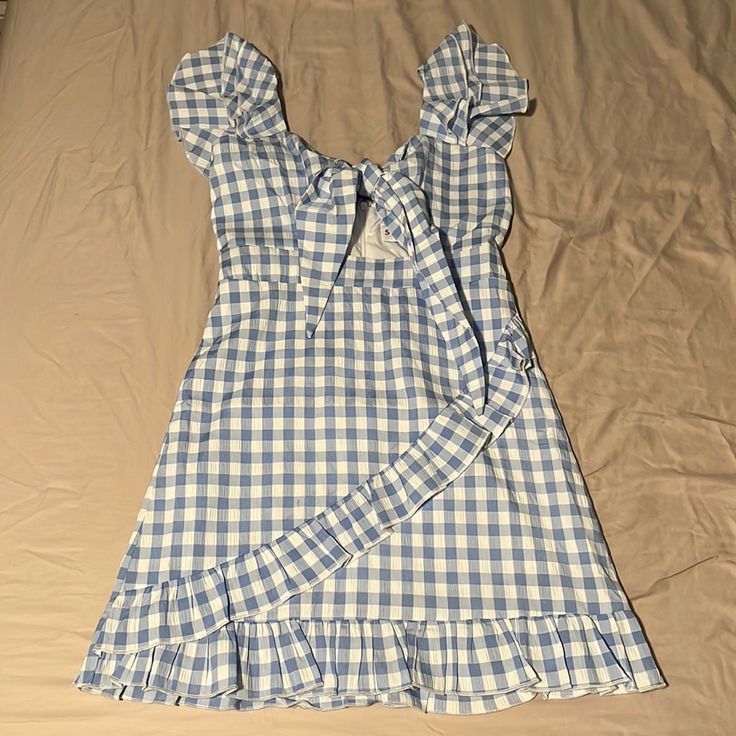 The Cutest Little Dress! Great For Spring And Summer! Size 4. Bnwt Cute Mini Dress With Tie Back, Mini Sundress With Ruffles For Picnic, Casual Gingham Dress With Tie Back, Mini Cotton Dress For Brunch, Cute Plaid Dress For Brunch, White Ruffle Hem Dress For Picnic, White Sundress For Picnic, Casual Tie Back Dress For Picnic, Cute Cotton Mini Dress For Picnic