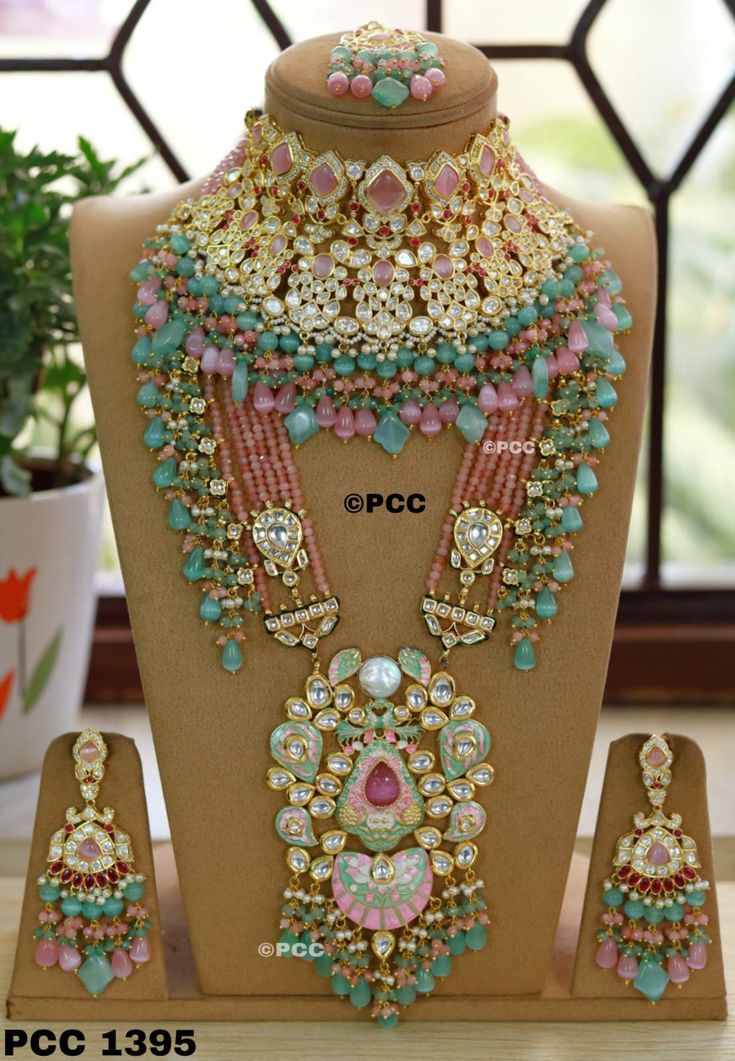 A Kundan Meena Polki bridal jewelry set can make a beautiful gift for occasions like weddings, anniversaries, birthdays, Mother's Day, and more. It's a thoughtful present for your wife, sister, or anyone celebrating a special event. The intricate craftsmanship and traditional design of Kundan Meena Polki jewelry make it a timeless and elegant choice. Whether it's for a Punjabi wedding or any other celebration, it's sure to be cherished.https://jewellerybypooja.etsy.com Happy Jewelry, Indian Bridal Jewelry Sets, Gold Jewellry, Fancy Jewellery Designs, Bridal Necklace Set, Polki Jewellery, Wedding Accessories Jewelry, Bridal Jewellery Indian, Wedding Preparation