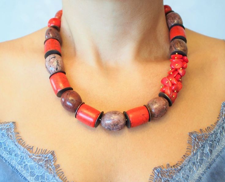 Big Bold natural stone beaded bib boho and hippie necklace is made of howlite, turquoise and coral  gemstones.  Howlite, coral and turquoise gemstones have healing effects on the human body. So this chunky choker necklace jewelry will be a perfect gift for mom, wife or close friends for their birthdays and for their special days. Necklaces are made from natural stones. So the shapes and the sizes of the stones may be slightly different from the one on the photo. This is definitely normal due to Handmade Artisan Coral Beaded Necklaces, Artisan Coral Beaded Necklace Handmade, Artisan Handmade Coral Beaded Necklace, Bohemian Coral Beaded Necklaces, Bohemian Coral Necklaces With Natural Stones, Bohemian Jewelry With Natural Stones And Red Coral, Bohemian Coral Necklace With Natural Stones, Unique Handmade Coral Beaded Necklace, Bohemian Red Coral Jewelry With Natural Stones