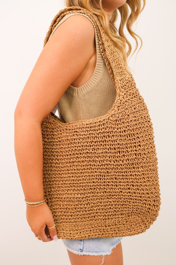 Effortlessly elevate your summer style with our Crochet Rattan Straw Hobo Bag! Handwoven from natural straw, this tote is easy to carry and perfect for your next getaway. Travel in style with our beautiful bag! Crochet rattan straw hobo bag Zippered closure Lined Eco-friendly Jute Hobo Bag For Summer, Summer Jute Shoulder Hobo Bag, Chic Jute Hobo Bag For Vacation, Natural Color Hobo Tote Bag For Spring, Chic Lightweight Straw Bag For Vacation, Trendy Natural Hobo Bag For Vacation, Beach Straw Hobo Bag, Summer Beach Jute Hobo Bag, Chic Handwoven Hobo Bag For Summer