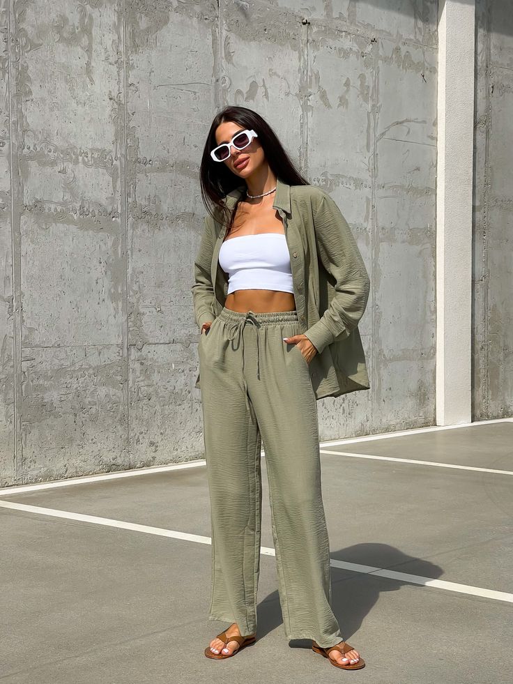 "🌿Women's wide leg pants in white, olive and blue colors. Loose and roomy fit creates comfort, while soft linen fabric soothes the skin. MORE: https://www.etsy.com/shop/ArtVyshyvankaUA?ref=seller-platform-mcnav§ion_id=38397051 🌿fabric: linen 80%, cotton 20% 🌿CARE: machine washable 30-40C (95-105F) / tumble dry low ----------------------------------------------------------------------------------------------------- Delivery time after shipping: USA 2-5 weeks Canada 4-6 weeks UK 3-5 weeks EU 1- Effortless Summer Loungewear Pants, Trendy Linen Wide Leg Pants For Spring, Chic Linen Wide Leg Lounge Pants, Trendy Linen Pants For Day Out, Khaki Summer Loungewear Pants, Relaxed Linen Wide Leg Pants For Day Out, Relaxed Fit Wide Leg Pants In Khaki, Green Linen Wide Leg Pants For Work, Khaki Bottoms For Summer Loungewear