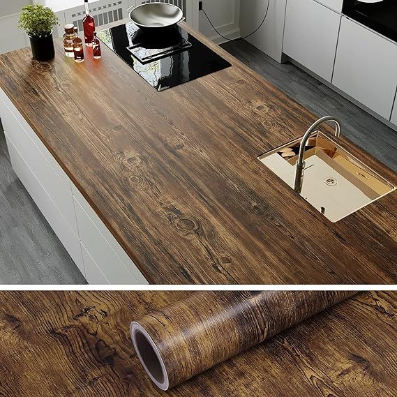 a kitchen counter top that has been made from wood and is being used as a sink