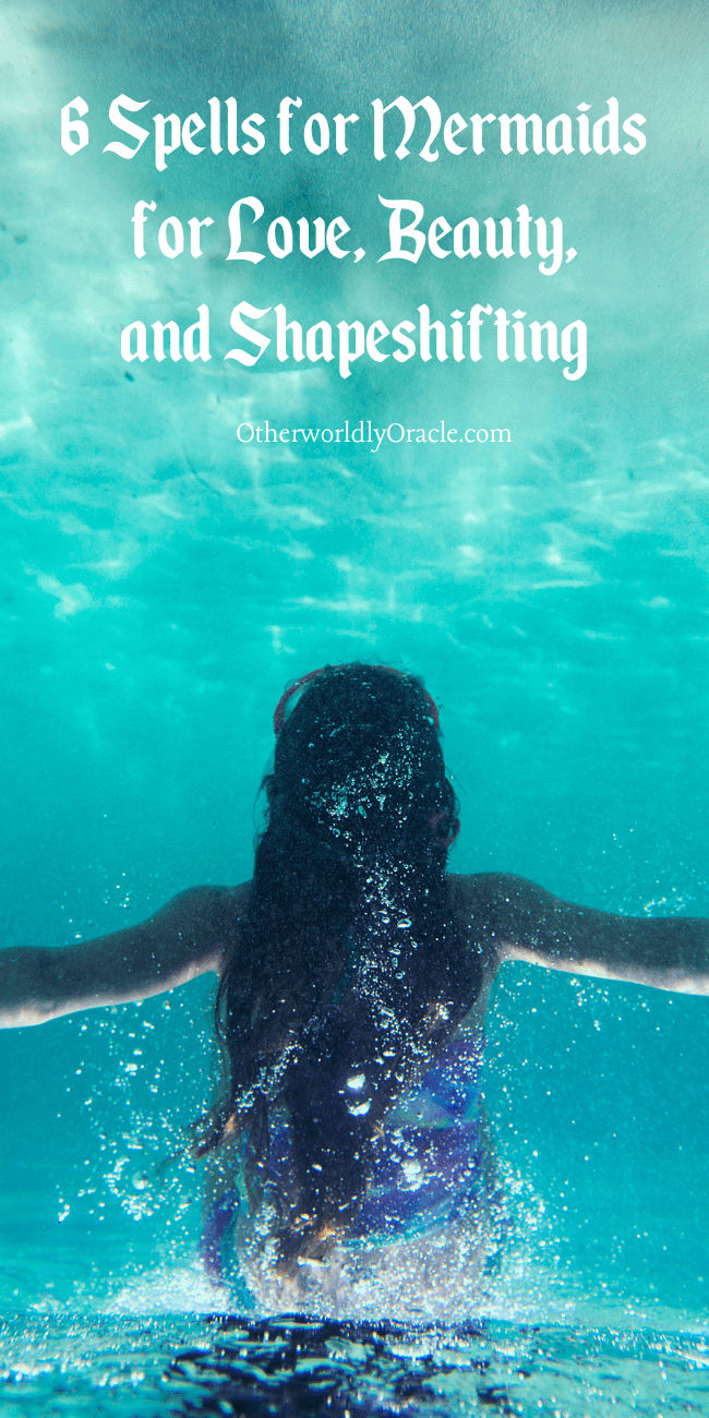 a woman swimming under water with the words 8 spells for mermaids for love, beauty and shopping