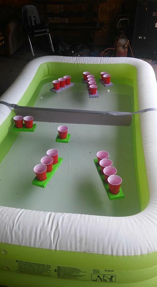 an inflatable beer pong table with cups on it and the words battleship beer pong was a great success