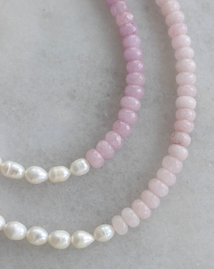 All things sweet & pearl! Choose from two gorgeous hues of pink and purple jade beads, split with real, freshwater pearls. Adjustable 15-17in. Finished off with 14K gold filled materials. Nickel and lead free. Pink Pearl Beaded Necklace With Pearl Charm, Dainty Pink Pearl Beaded Necklaces, Handmade Pink Pearl Necklace, Pink Pearl Drop Beaded Necklaces With Round Beads, Pink Pearl Chain Beaded Necklaces With Round Beads, Pink Pearl Chain Beaded Necklace With Round Beads, Pink Pearl Chain Necklace With Round Beads, Pink Pearl Beaded Necklaces With Gemstone Beads, Pink Round Beads Pearl Necklace For Gift