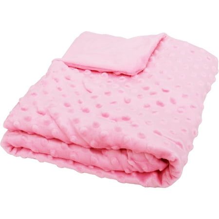 a pink blanket with polka dots on it