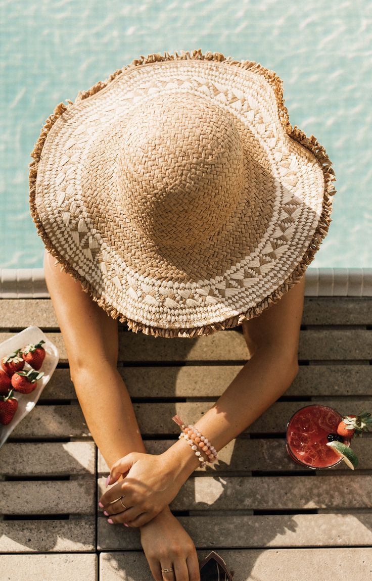 Ok, this one is stunning! The Sangria is a rounded head, casual beach style woven straw hat with raw edges, AND added, may we say, exquisite braiding and woven pattern trim. So cutie! MMT8264 Vince Camuto Straw Hat, Vacation Woven Straw Hat, Cream Toquilla Straw Hat For Vacation, Chic Braided Straw Sun Hat, Vacation Straw Hat With Woven Details, Natural Straw Beach Hat, Chic Cream Straw Hat For Vacation, Bohemian Woven Straw Hat For Warm Weather, Straw Hat For Pool Vacation