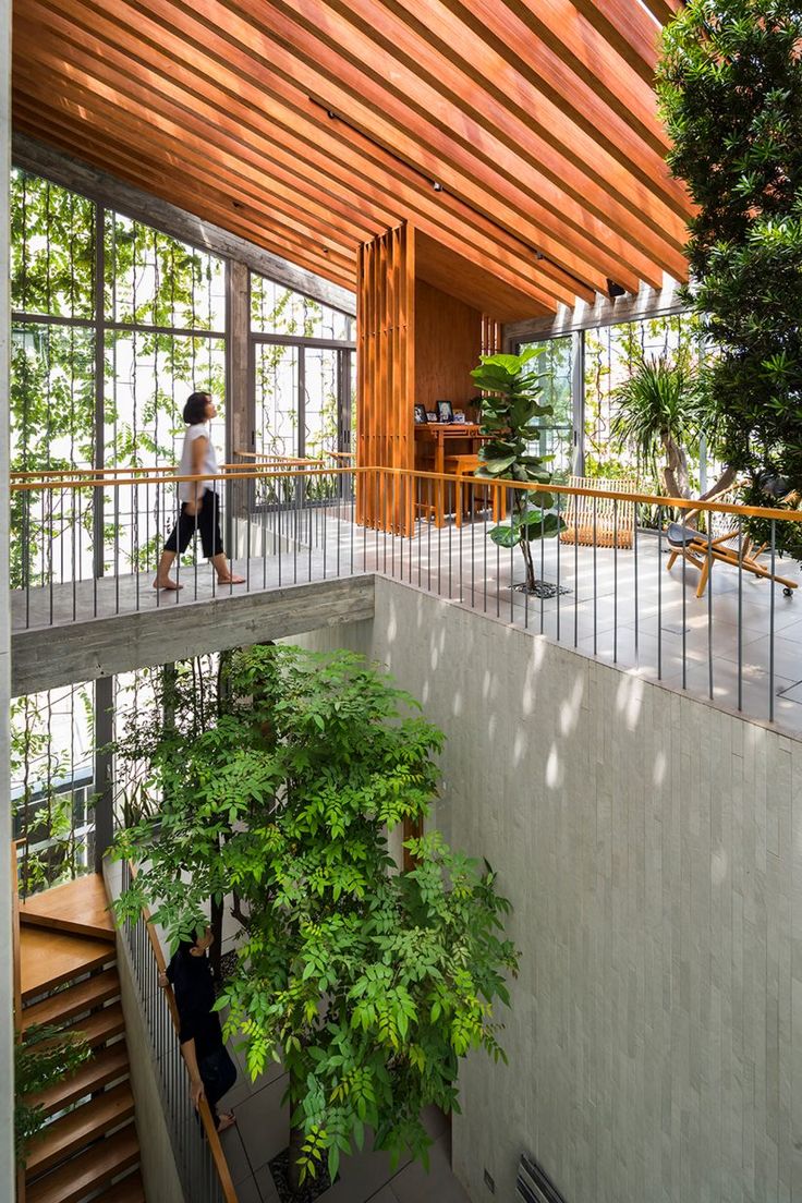 a person walking up some stairs in a building