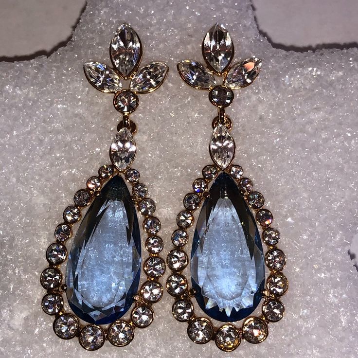 Beautiful Earrings By Iman - Hsn Designer. They Are Pierced And Drop Or Dangle Style. Bullet-Disc Backs. They Feature Three Different Shaped Crystals. They Measure Just Under 2.25" Long. Pictures Are Without And Without Flash To Show Detail. Questions Always Welcome. Elegant Blue Drop Crystal Earrings, Blue Crystal Drop Earrings For Formal Occasions, Blue Dangle Crystal Earrings For Formal Occasions, Blue Drop Crystal Earrings For Party, Elegant Light Blue Crystal Earrings For Party, Elegant Blue Drop Chandelier Earrings, Blue Dangle Crystal Earrings For Evening, Blue Teardrop Jewelry For Evening, Blue Teardrop Chandelier Earrings For Formal Occasions