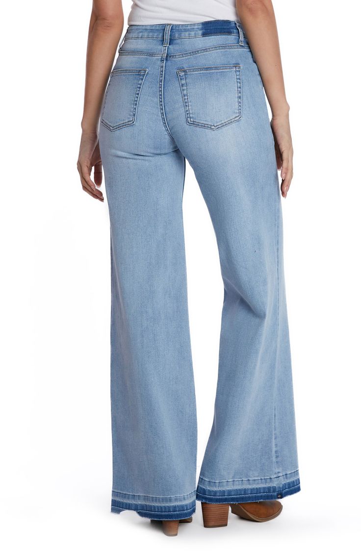 Released hems add a trend-right detail to these vintage-inspired, full-length, wide-leg jeans made with a hint of comfy stretch. 32" inseam; 23 1/2" leg opening; 10 1/2" front rise Zip fly with button closure Five-pocket style 66% cotton, 22% REPREVE® recycled polyester, 8% polyester, 3% rayon, 1% spandex REPREVE recycled polyester is made from 100% post-consumer recycled plastic bottles Machine wash, tumble dry Imported Relaxed Fit Cotton Flare Jeans, Relaxed Fit Full Length Cotton Flare Jeans, Spring Cotton Flare Jeans Full Length, Spring Cotton Full-length Flare Jeans, Spring Cotton Full Length Flare Jeans, Spring Full Length Cotton Flare Jeans, Washed Wide Leg Flare Jeans In Cotton, Mid-rise Washed Blue Cotton Flare Jeans, Casual Wide-leg Flare Jeans With Frayed Hem