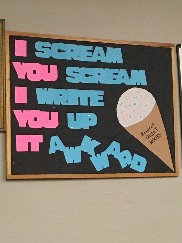 an ice cream poster is hanging on the wall next to a framed sign that says, i scream you scream write up it awkward