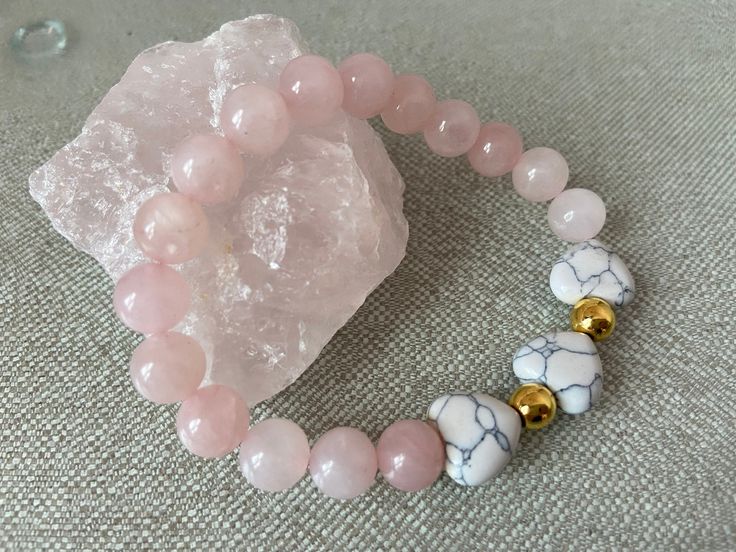 Rose Quartz is known to attract and support unconditional love. The most popular and powerful uses for a Rose Quartz crystal are for attracting love and partnership. Going beyond romantic love, the Rose Quartz crystal stone meaning is also strongly linked with compassion and unconditional love, making it a powerful stone for deepening relationships of any kind.  Rose Quartz crystal supports you on your healing journey so you can bring your heart center back to its highest frequency. Rose quartz Adjustable Spiritual Bracelets For Valentine's Day, Heart-shaped Spiritual Bracelets For Mother's Day, Spiritual Heart-shaped Bracelets For Mother's Day, Spiritual Heart Bracelets For Mother's Day, Heart-shaped Gemstone Beads Bracelets For Gift, Heart-shaped Gemstone Beads Bracelets As Gift, Heart-shaped Gemstone Beads Bracelet For Gift, Heart-shaped Gemstone Beads Bracelet As Gift, Pink Spiritual Bracelet For Mother's Day