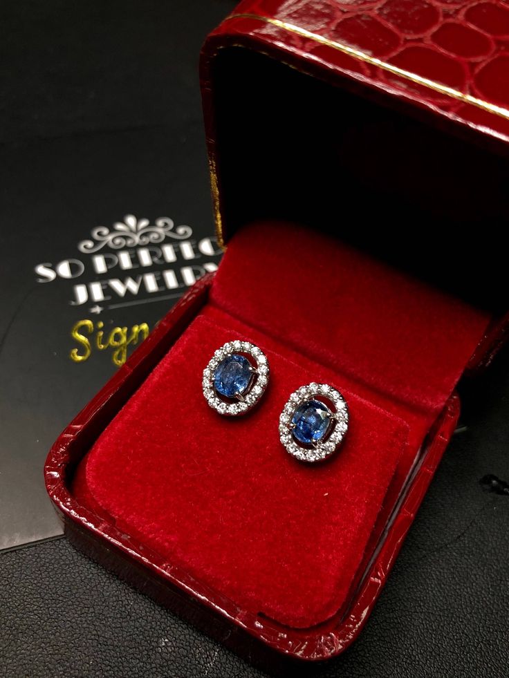 ENJOY OUR WORRY-FREE SERVICE AND THE DAZZLING, GENUINE JEWELRY WE DESIGN AND HANDCRAFT WITH LOVE❤️ ABOUT THE ITEM: STUNNING CEYLON BLUE SAPPHIRES AND NATURAL DIAMONDS, SET IN SIMPLE YET BEAUTIFUL 18K SOLID WHITE GOLD STUDS. The sapphires are transparent and sparkling, clean, with exotic pastel blue color that go along well with light color clothing! The diamonds help accentuate the sparkle! Set in modernly designed 18K solid white gold earrings. Perfect for everyday! SUGGESTED RETAIL VALUE: $7,8 Gia Certified Sapphire Diamond Earrings For Formal Occasions, Formal Gia Certified Sapphire Diamond Earrings, Gift Blue Sapphire Diamond Earrings, Sapphire Diamond-cut Earrings, Blue Sapphire Diamond Earrings As Gift, Blue Diamond Gemstone Earrings For Anniversary, Blue Gemstone Diamond Earrings For Anniversary, Blue Cubic Zirconia Diamond Earrings For Wedding, Elegant Blue Gia Certified Diamond Earrings